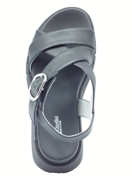 Nero Giardini NeroGiardini E513696D Tamigi Nero Sandali per Donna in pelle con fibiona e zeppa alta Nero